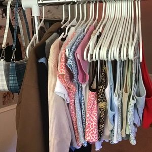 Half of my Brandy Melville tank collection!!